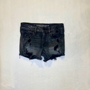 Black jean shorts with rips